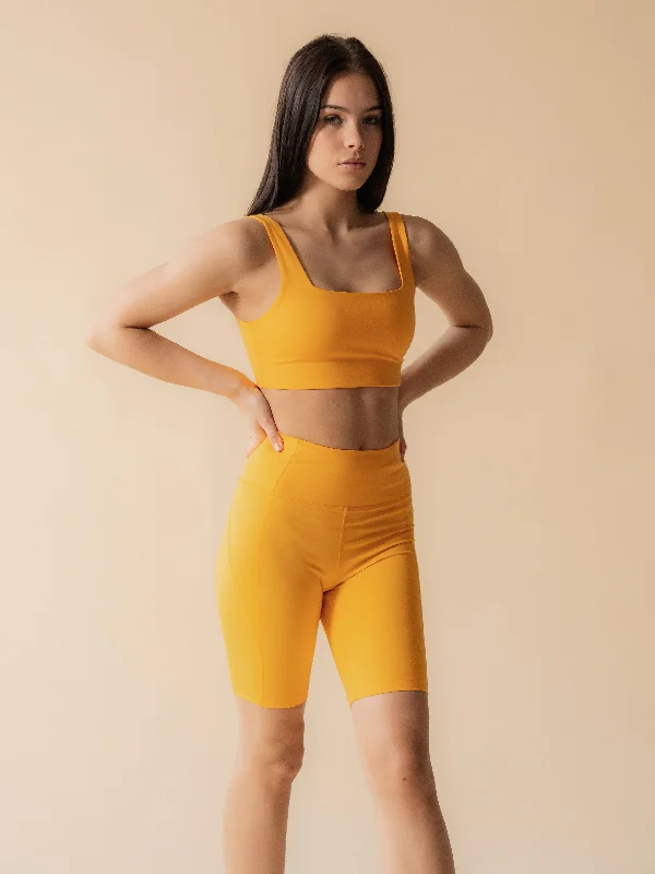 Girlfriend Collective Compressive High-Rise Bike Shorts - Golden Glow